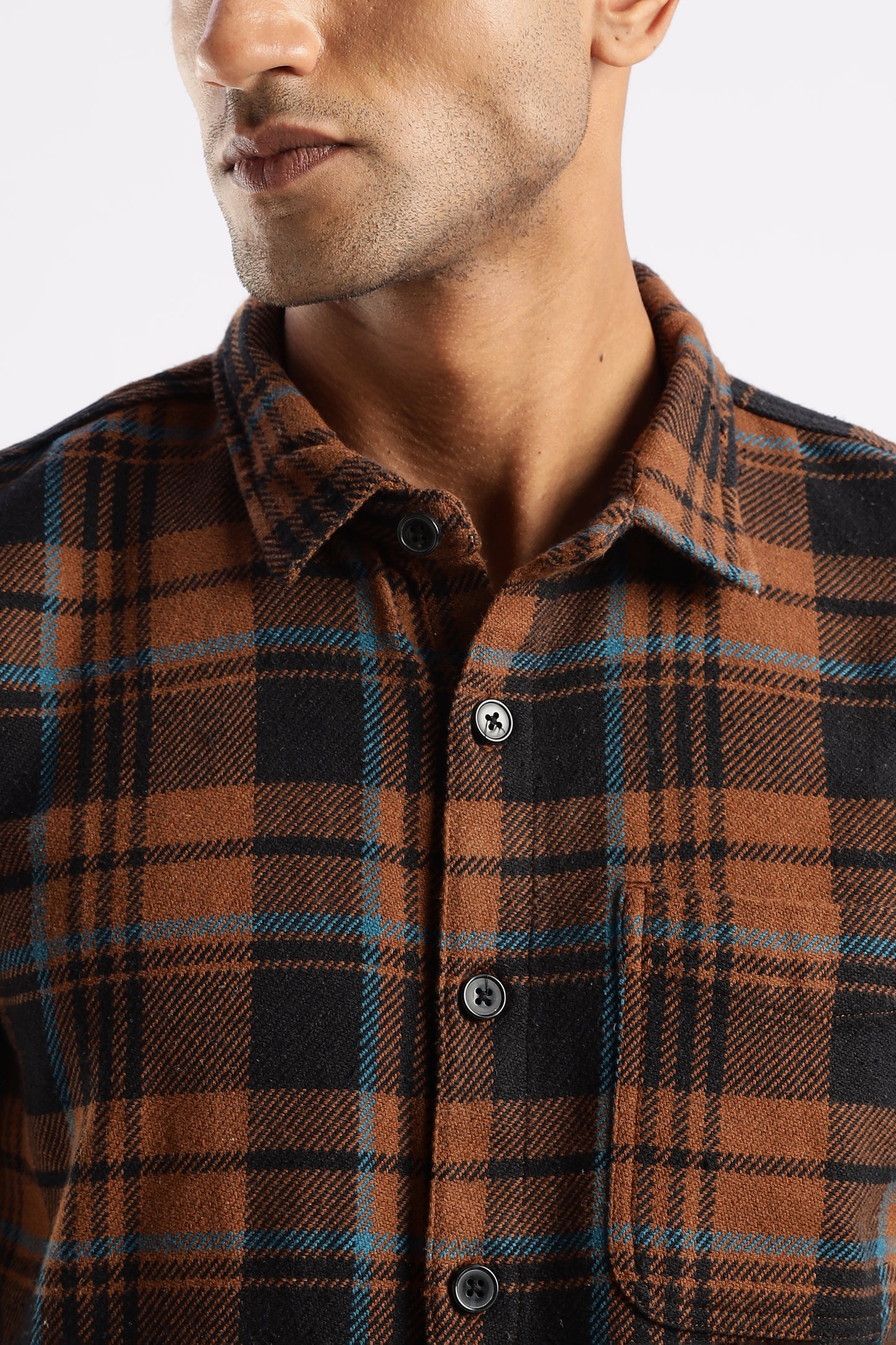 Timberland Rust warm-toned flannel shirt designed for transitional weather