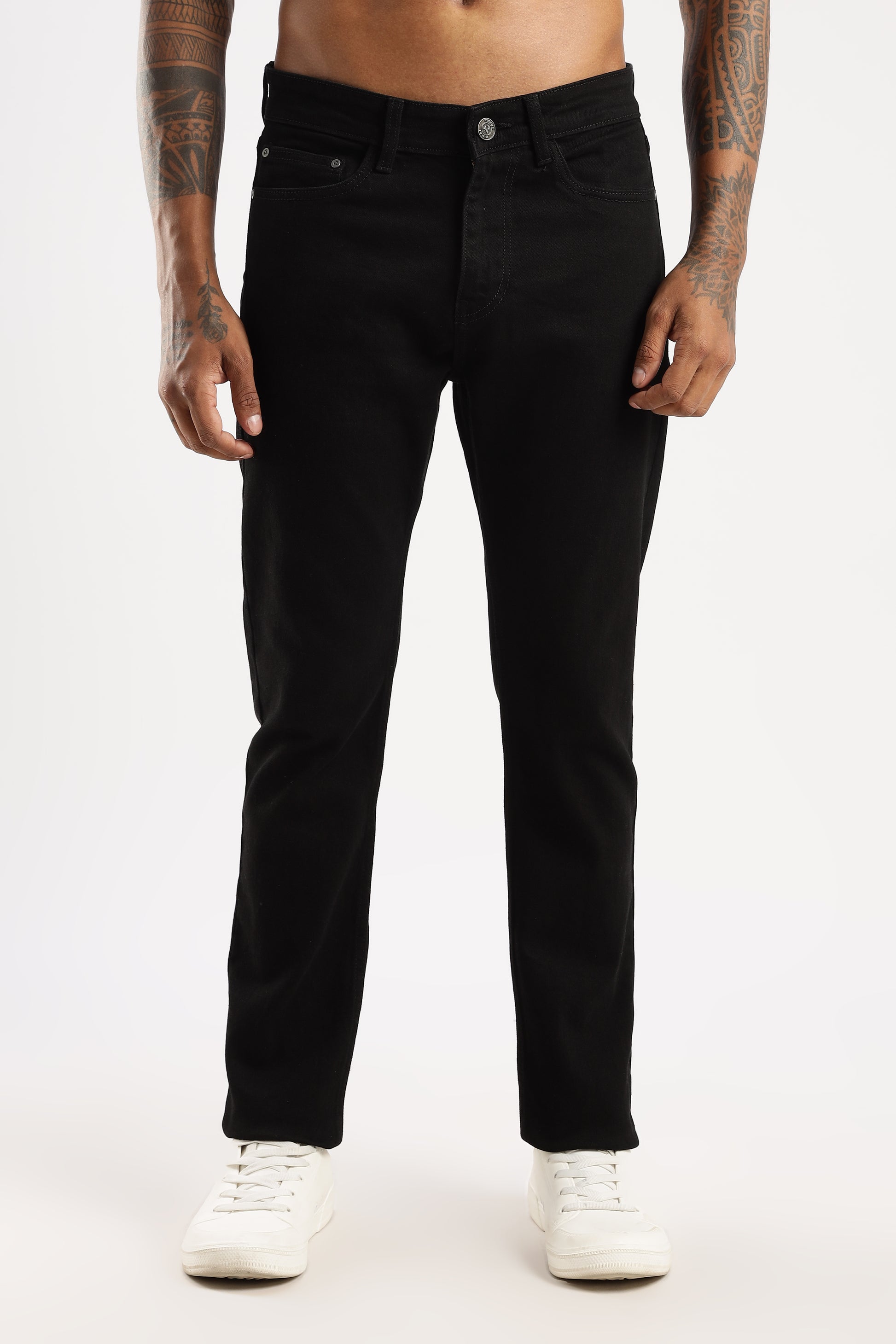 Model wearing Sleek Tapered Fit Jeans in Shadow Trail with modern slim tapered cut